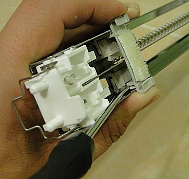 Popping off the top of the Charge wire cleaning shuttle